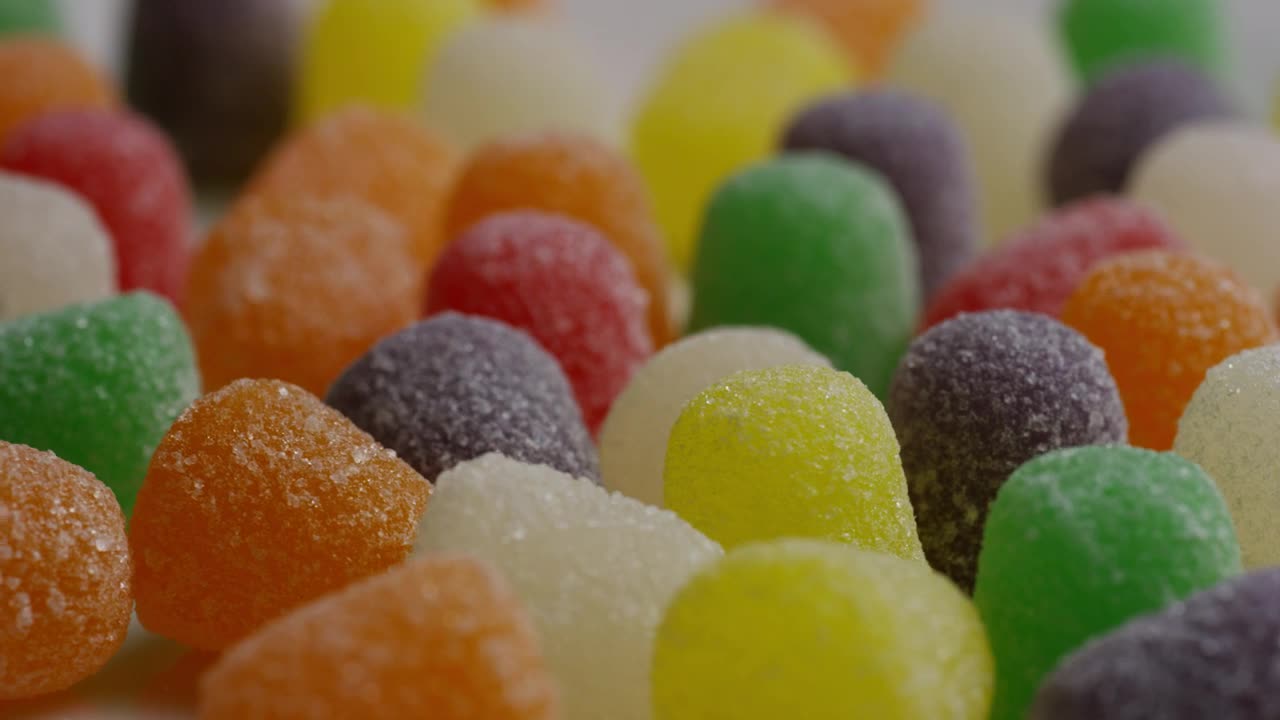 Free Video Stock texture of colored gummies spinning slow Live Wallpaper