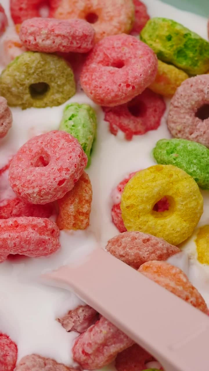 Free Video Stock texture of colored rings cereal with yogurt Live Wallpaper