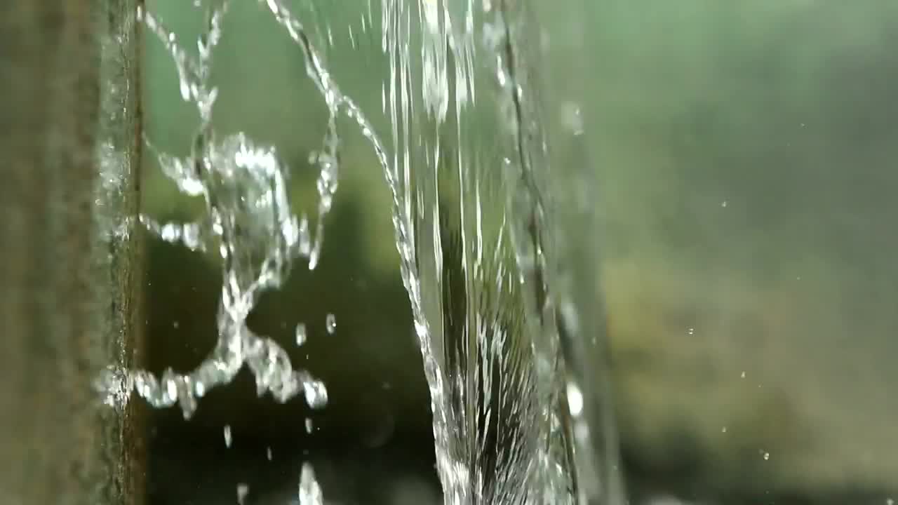 Free Video Stock texture of water flowing from a fountain Live Wallpaper