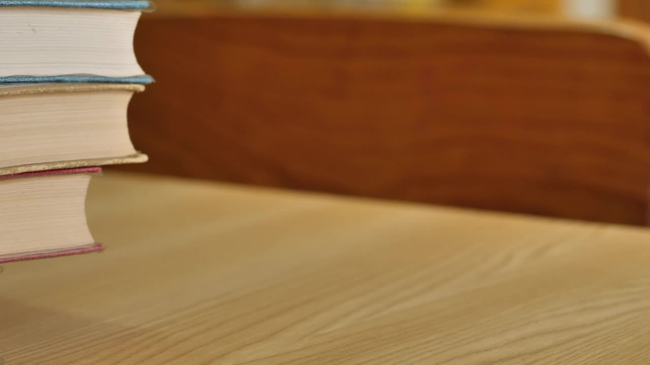 Free Video Stock thick old stacked books viewed in detail Live Wallpaper