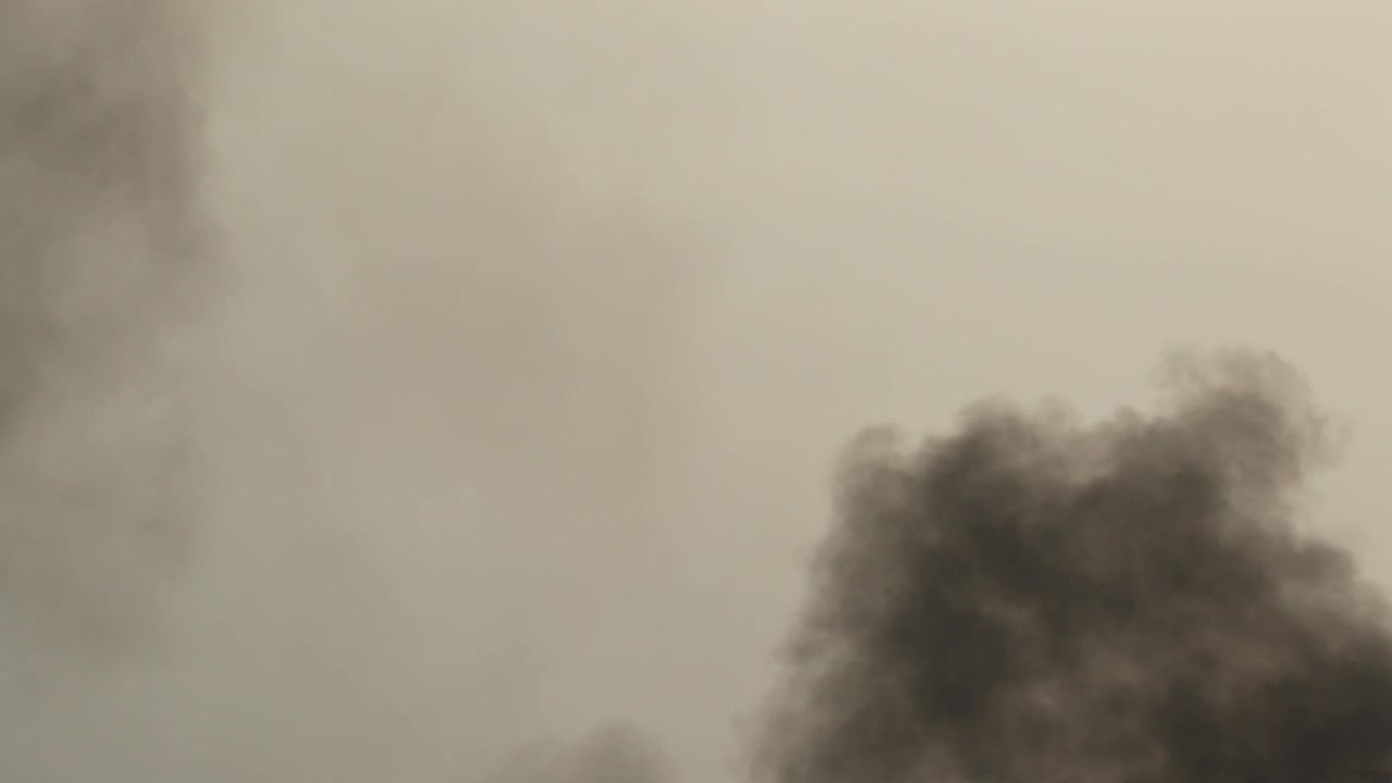 Free Video Stock thick smoke rising from the ground Live Wallpaper