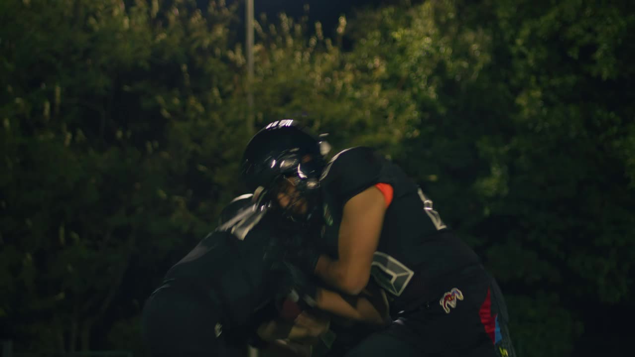 Free Video Stock three football players training at night Live Wallpaper