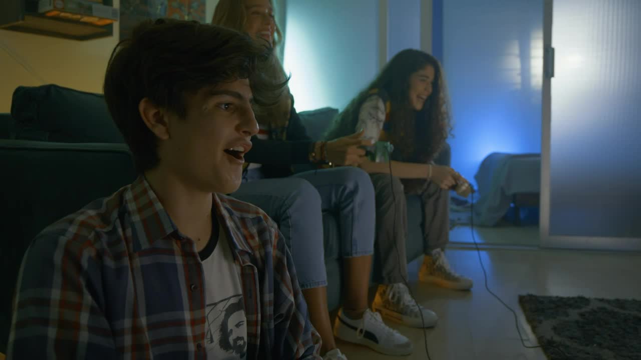 Free Video Stock three friends having fun playing video games 42672Live Wallpaper