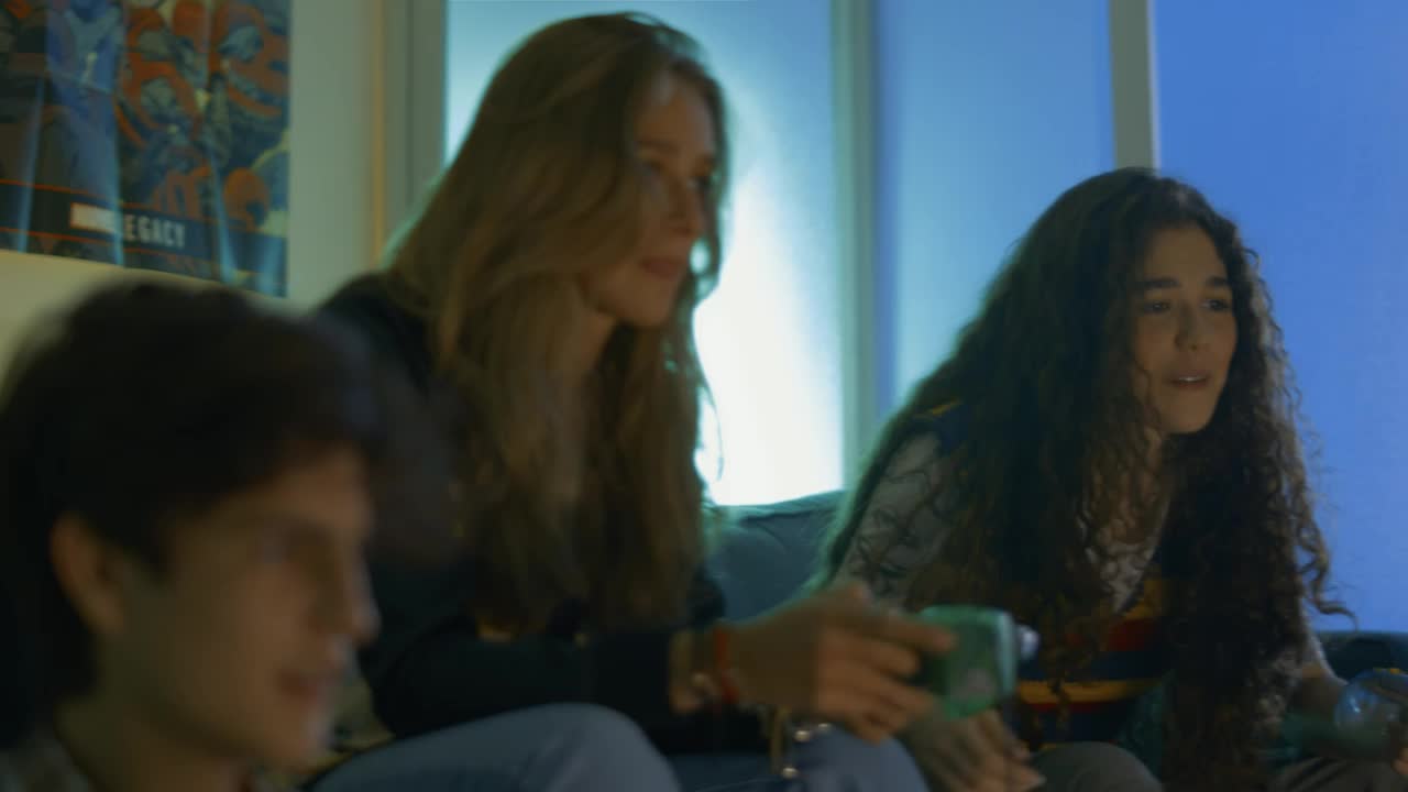 Free Video Stock three friends having fun playing video games Live Wallpaper