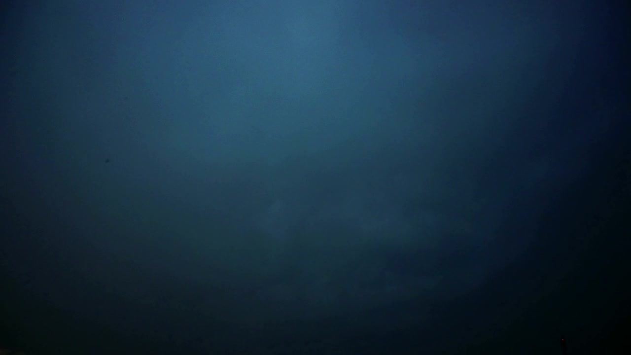 Free Video Stock thunderstorm across the night sky Live Wallpaper