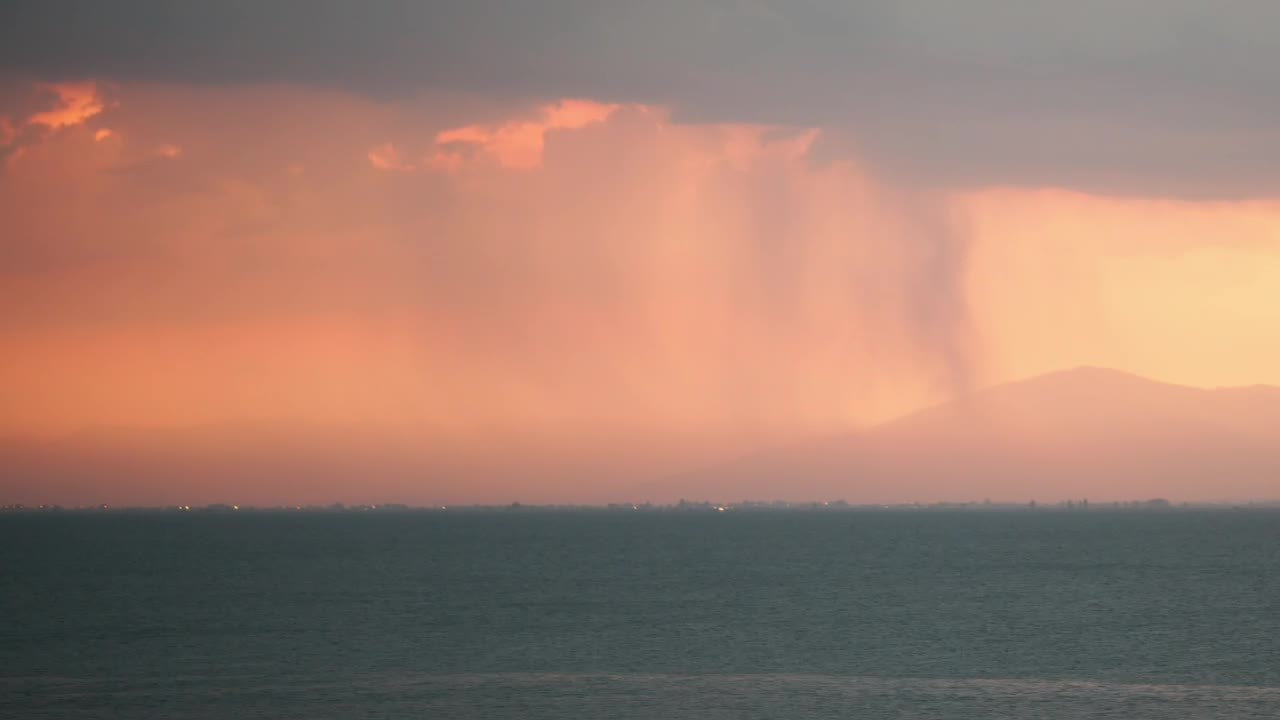 Free Video Stock thunderstorm heading over an island Live Wallpaper