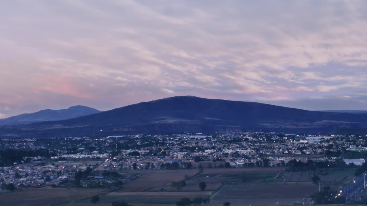 Free Video Stock time lapse of a city mountains and traffic Live Wallpaper