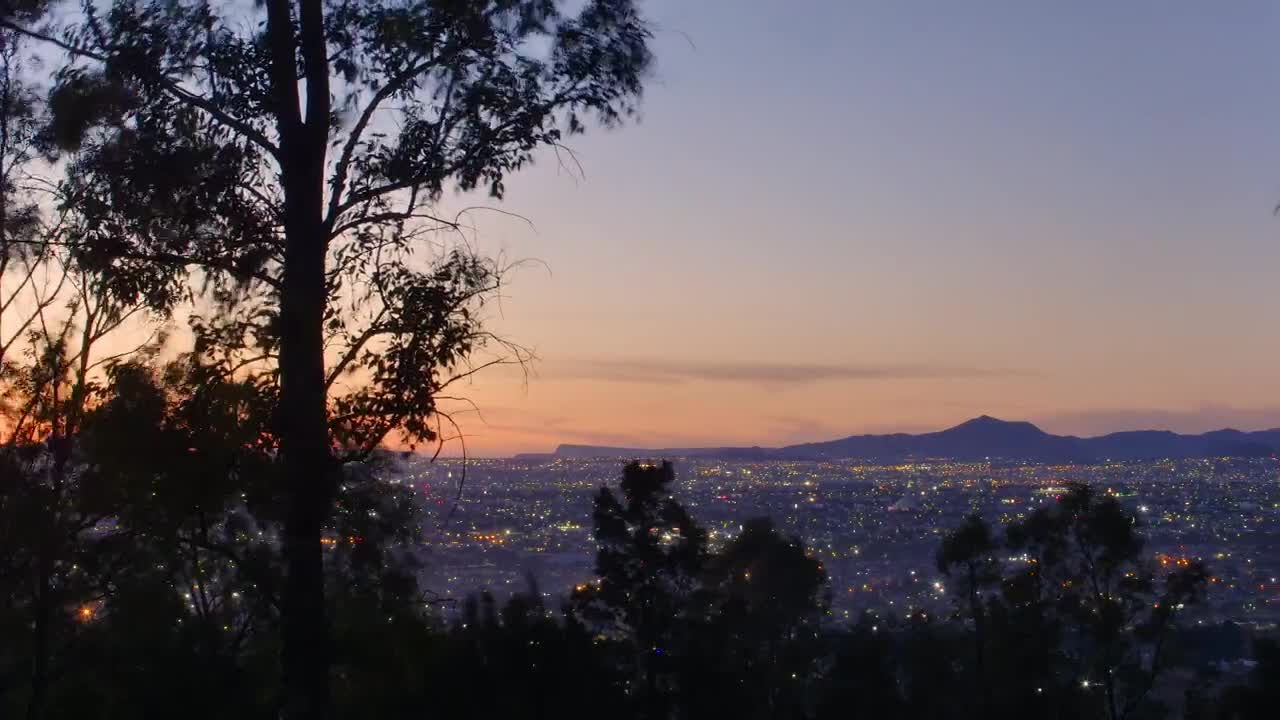 Free Video Stock time lapse of a small town at night Live Wallpaper