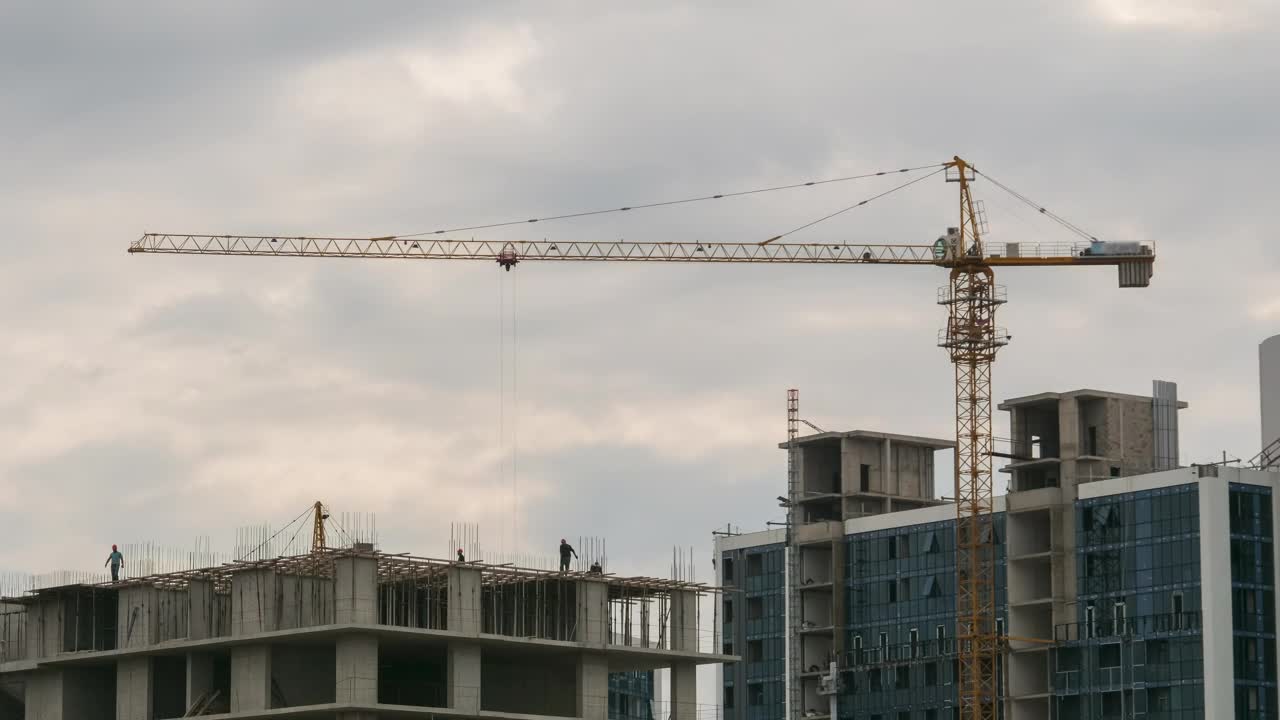 Free Video Stock time lapse of workers and construction cranes Live Wallpaper
