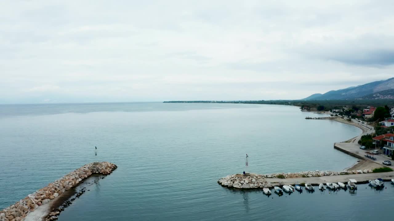 Free Video Stock tiny harbor at the edge of an island Live Wallpaper