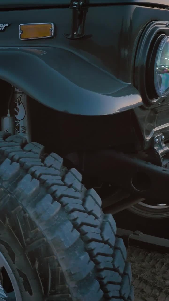 Free Video Stock tire of a jeep on a dirt road Live Wallpaper