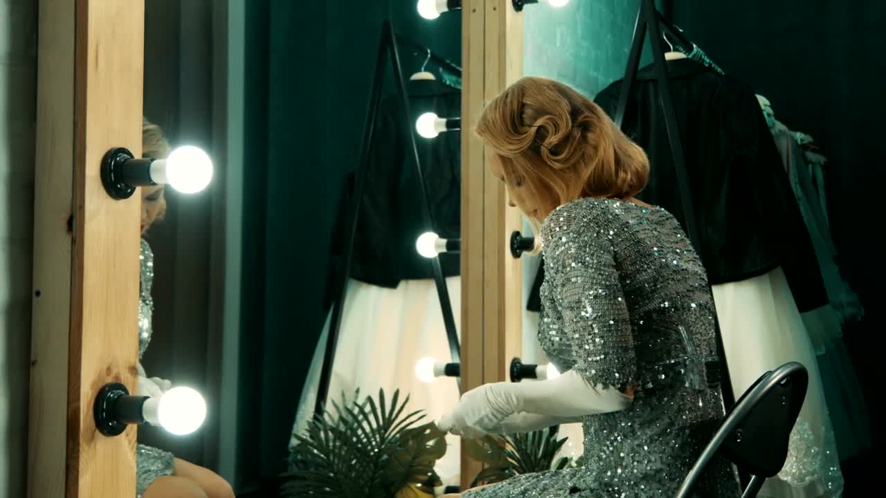 Free Video Stock tired actress removing her gloves after the show Live Wallpaper