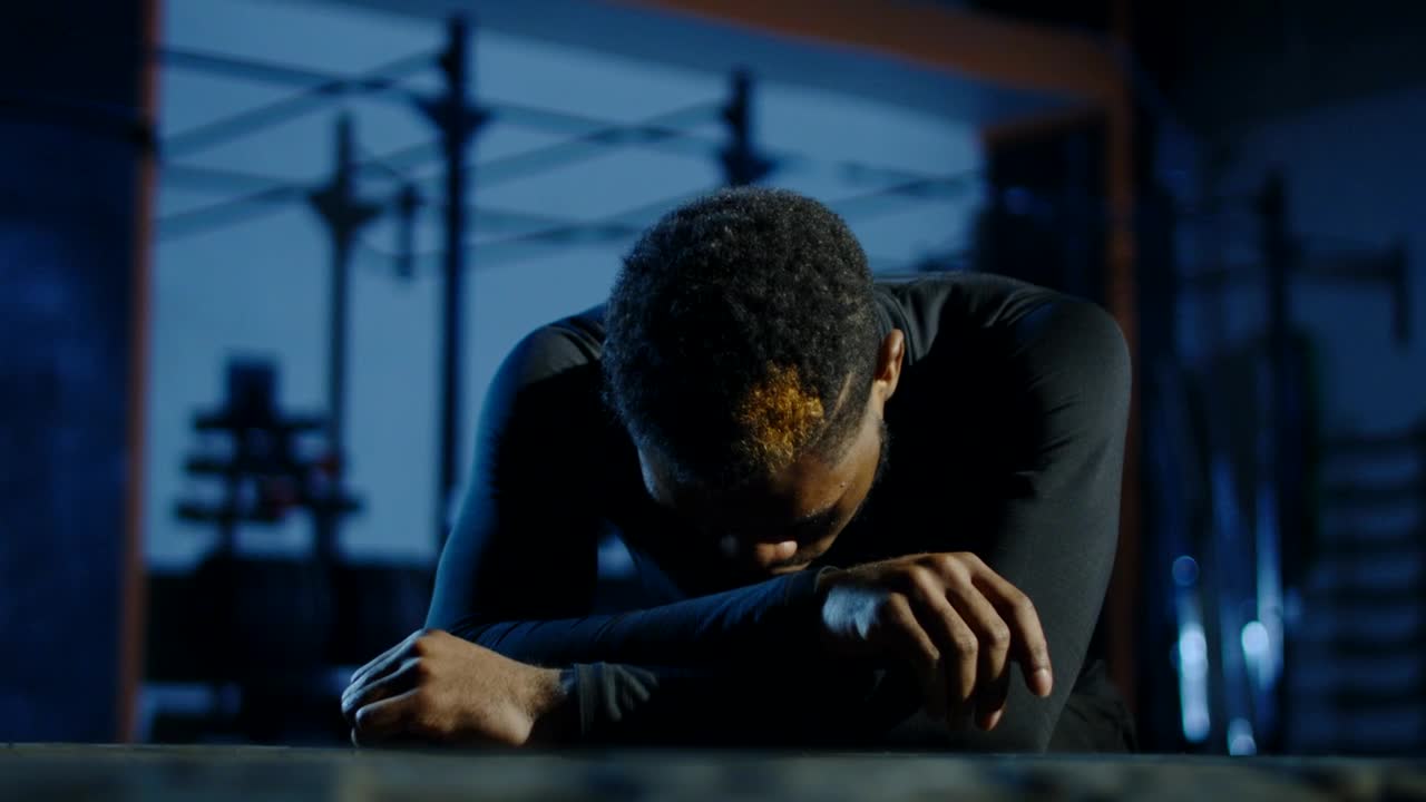 Free Video Stock tired athlete catching his breath Live Wallpaper