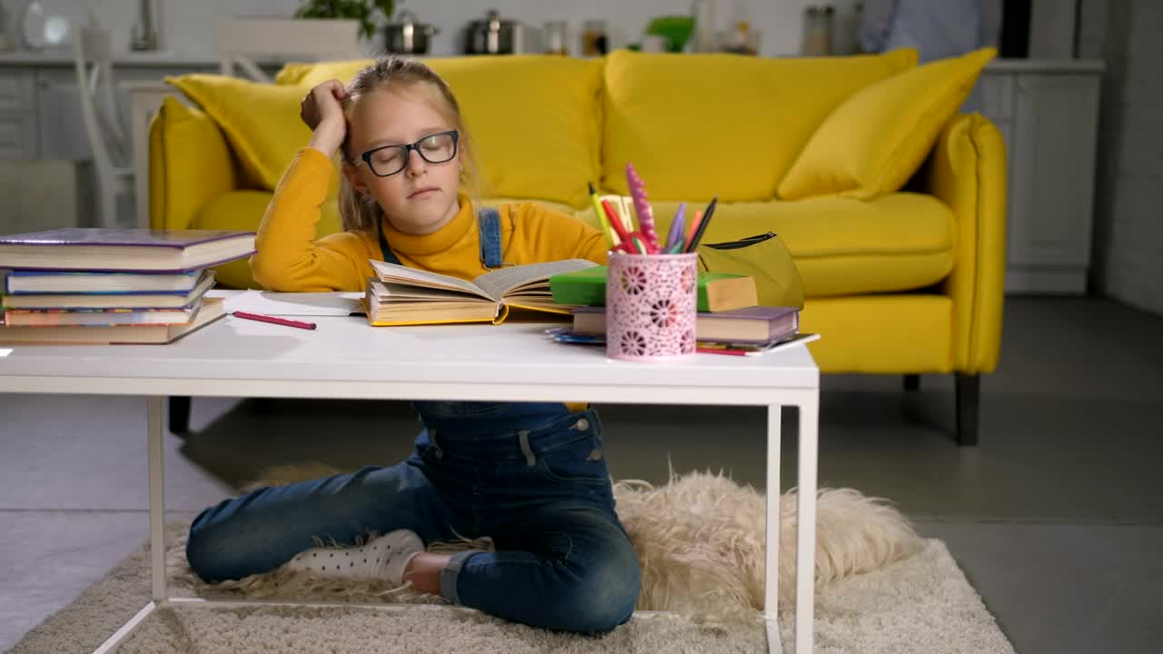 Free Video Stock tired child trying to study Live Wallpaper