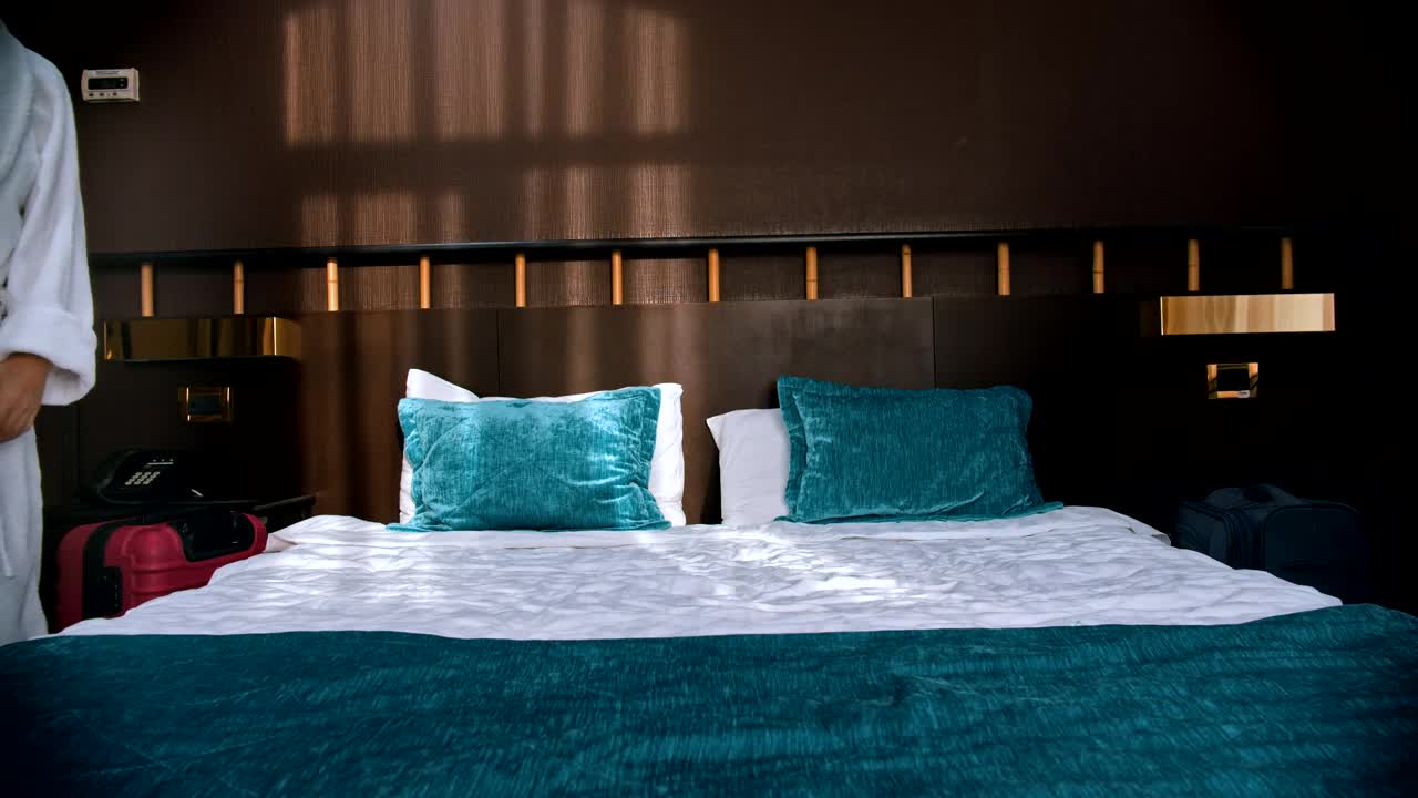 Free Video Stock tired family in bathrobes in an hotel room Live Wallpaper