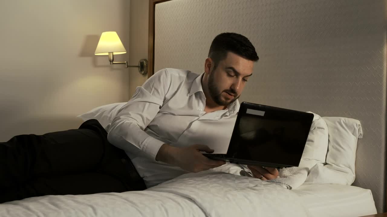 Free Video Stock tired man preparing to sleep Live Wallpaper