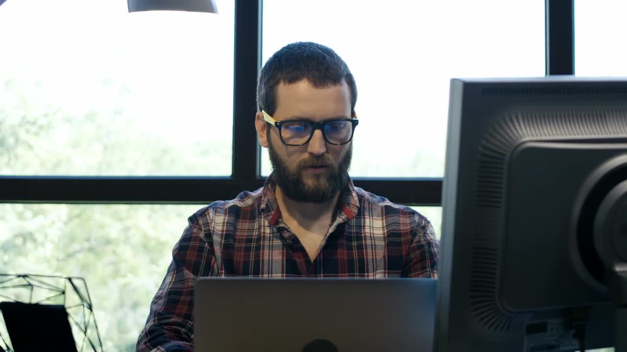 Free Video Stock tired man stretching and his desk Live Wallpaper