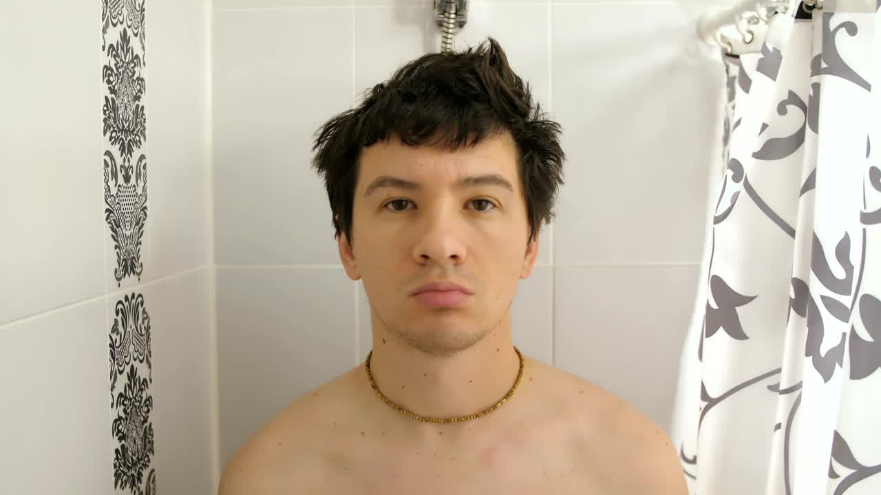 Free Video Stock tired man taking a shower Live Wallpaper