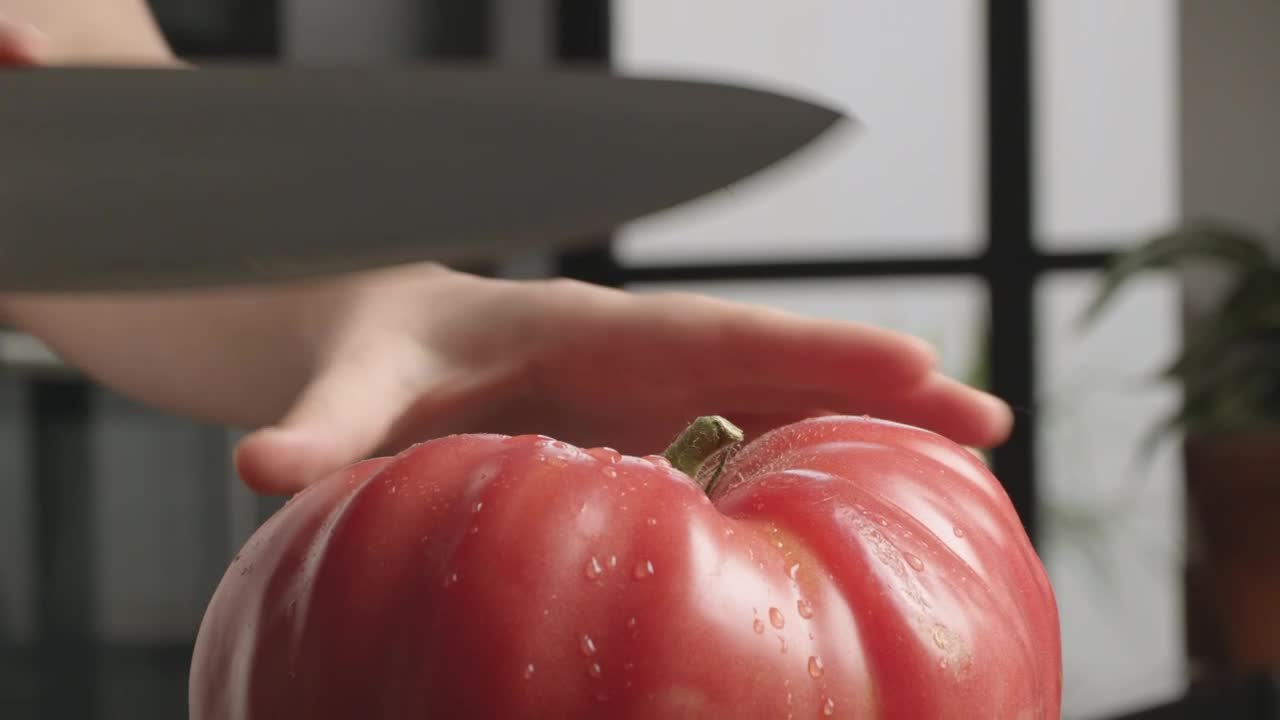 Free Video Stock tomato being prepared in a kitchen Live Wallpaper