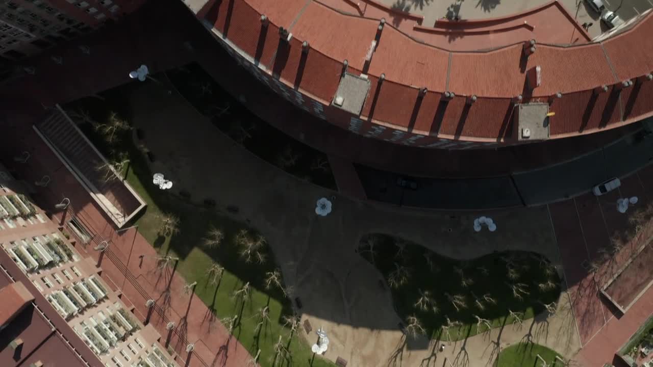 Free Video Stock top aerial shot crossing barcelona buildings Live Wallpaper