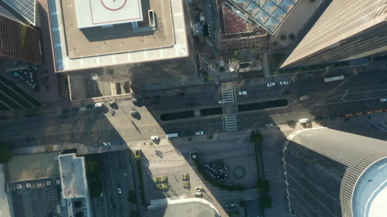 Free Video Stock top aerial shot of a city with little traffic Live Wallpaper