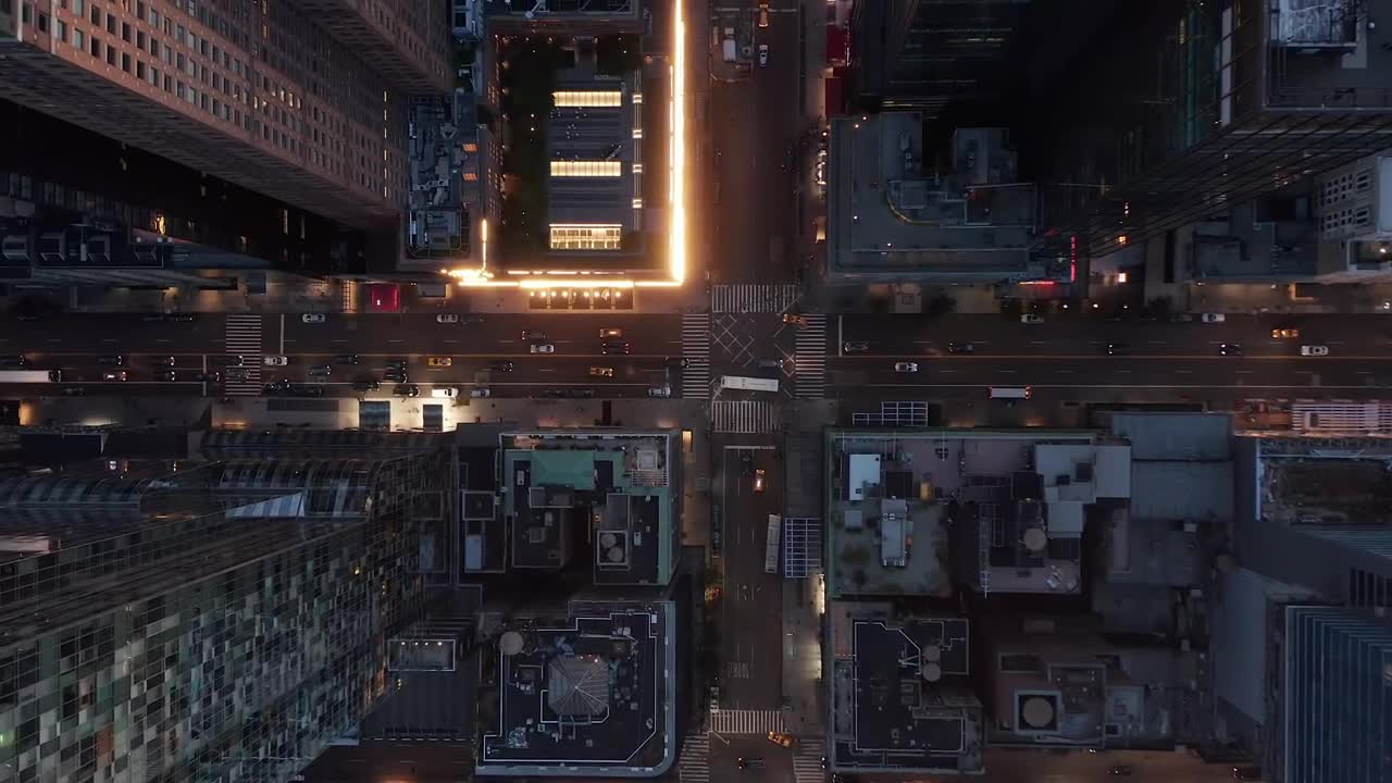 Free Video Stock top aerial shot of the city life at night Live Wallpaper