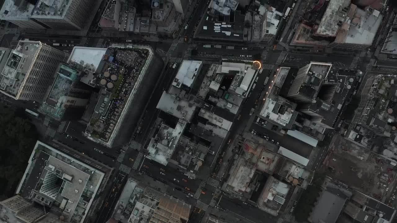 Free Video Stock top aerial shot of the rooftops of the city Live Wallpaper