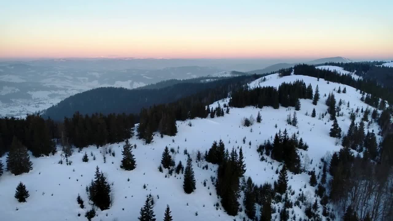 Free Video Stock top of a mountain in winter aerial view Live Wallpaper