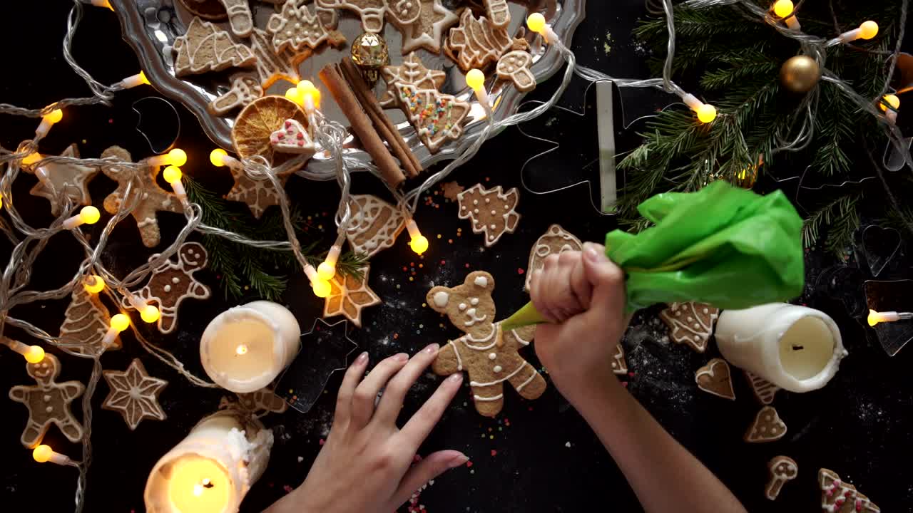 Free Video Stock top view of a persons hands preparing christmas cookies Live Wallpaper