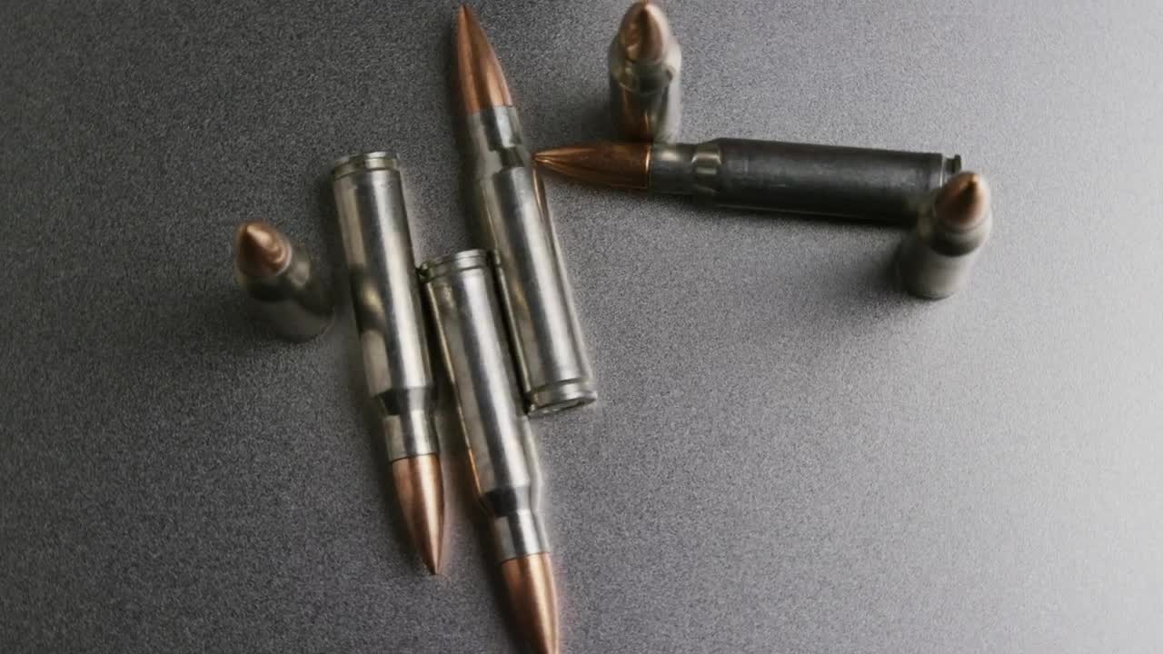 Free Video Stock top view of gun ammunition spinning Live Wallpaper