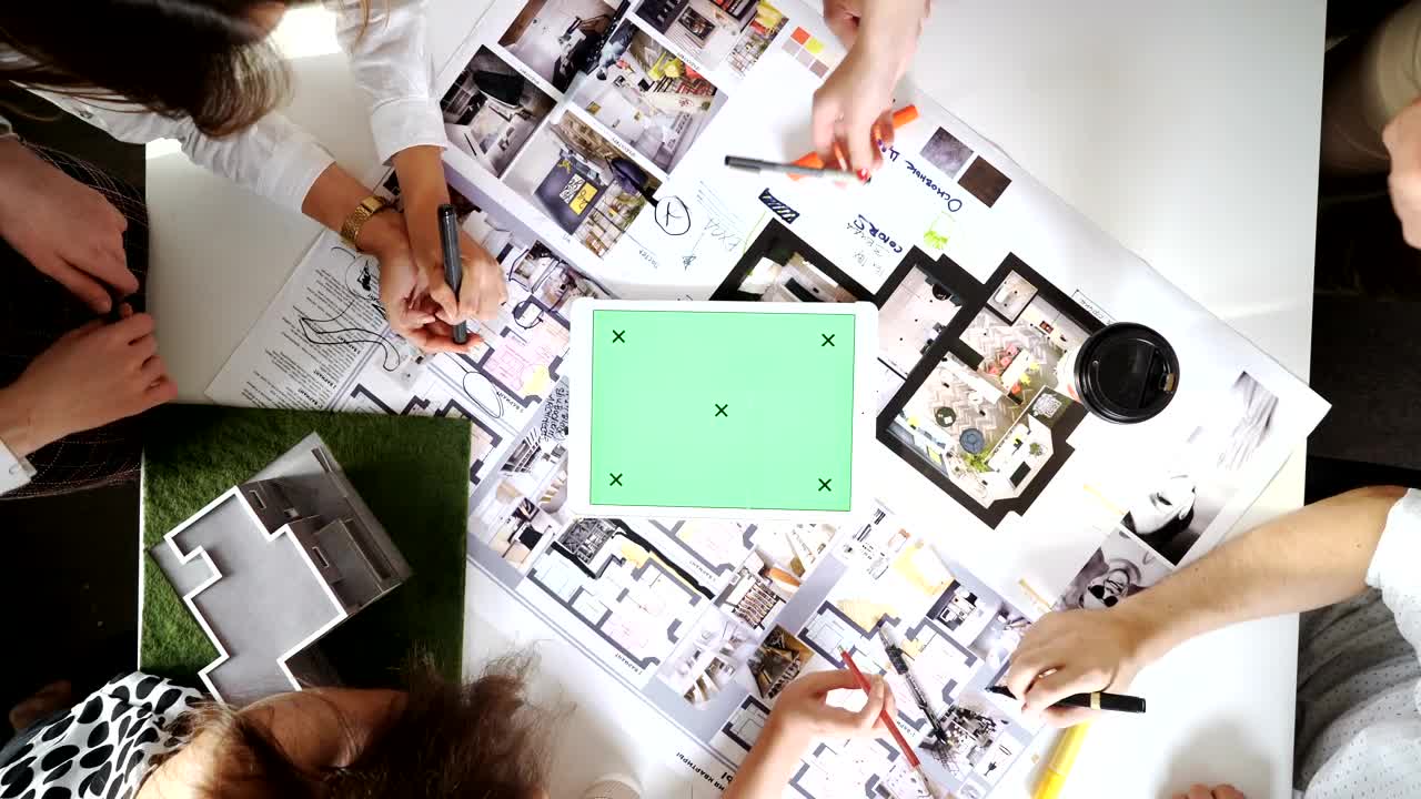 Free Video Stock top view of green screen tablet on design table with Live Wallpaper