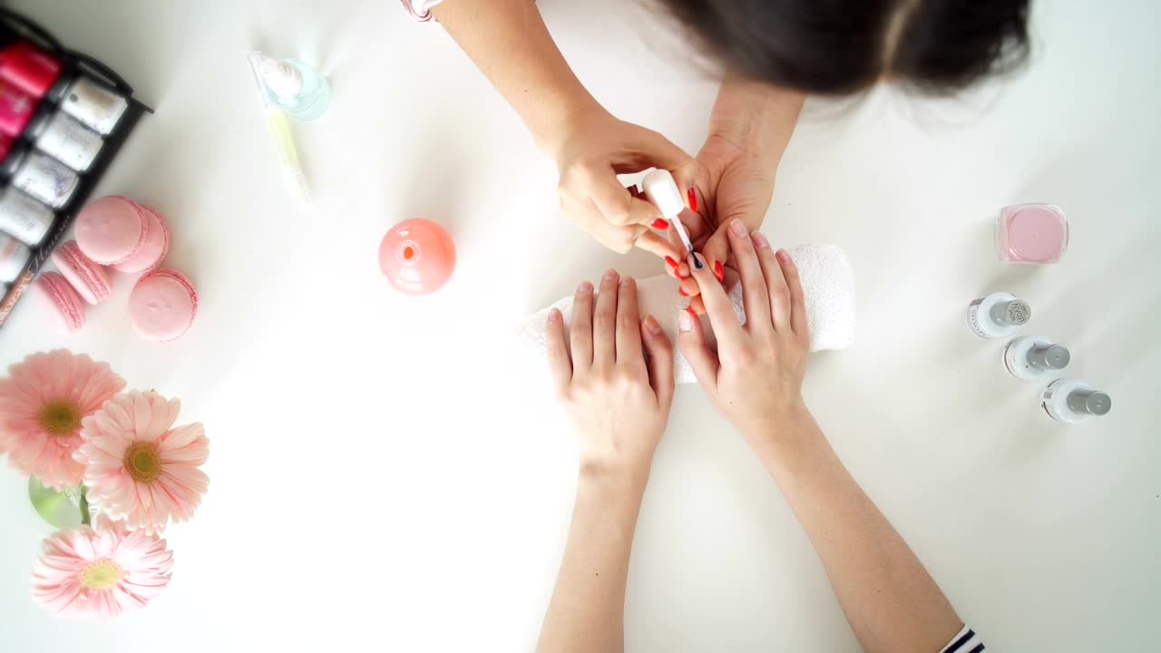 Free Video Stock top view of manicure nail painting timelapse Live Wallpaper