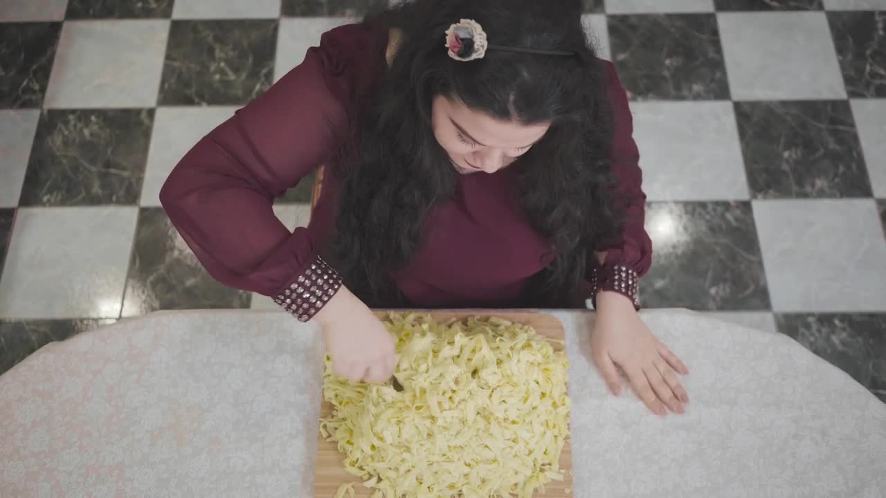 Free Video Stock top view of obese woman eating huge dish of pasta Live Wallpaper