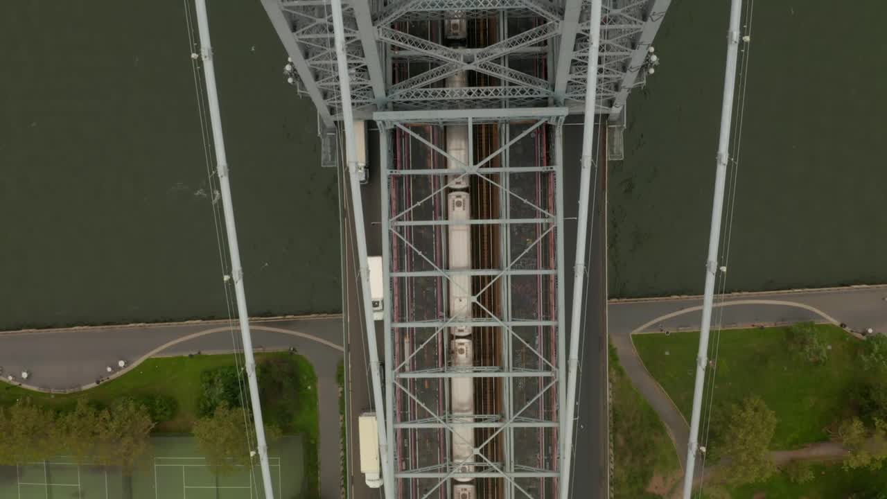 Free Video Stock top view of train and traffic crossing a bridge Live Wallpaper