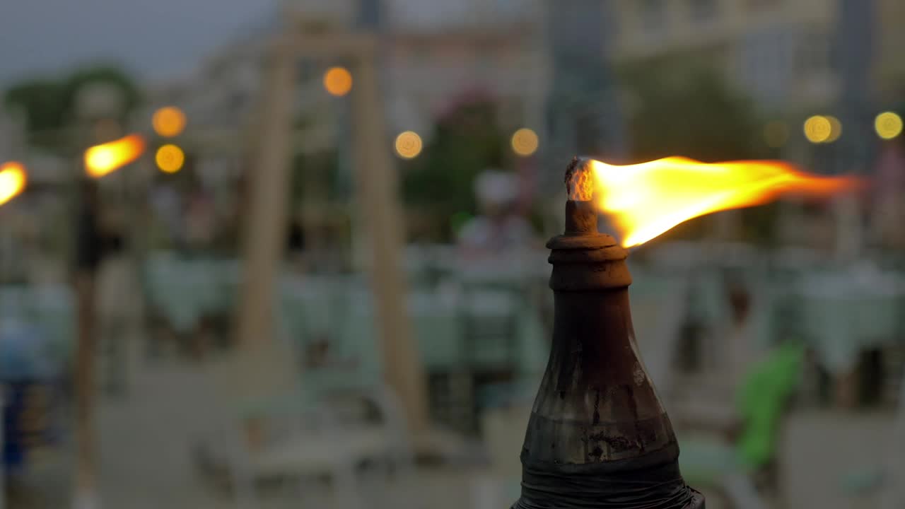 Free Video Stock torch burning at the beach Live Wallpaper