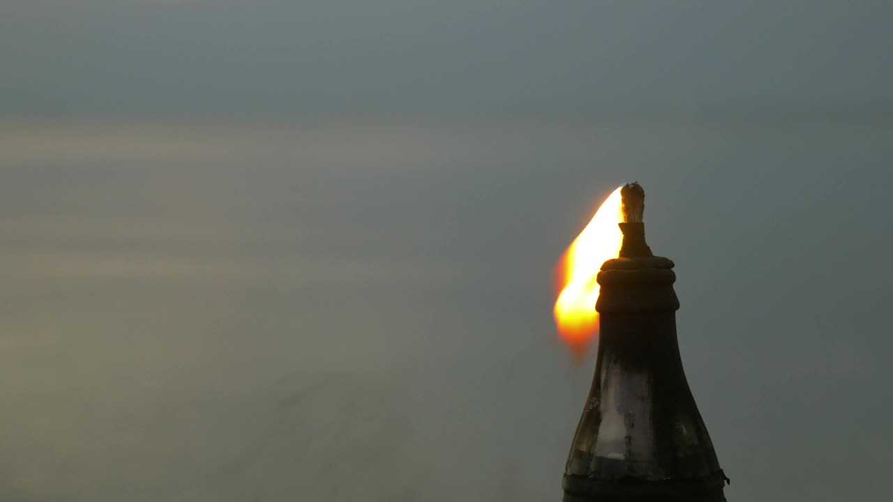 Free Video Stock torch burning in the evening Live Wallpaper