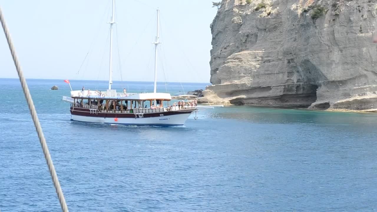 Free Video Stock tourist boat entering a bay Live Wallpaper