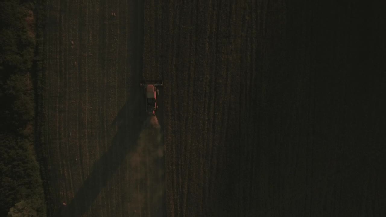 Free Video Stock tractor driving over a field Live Wallpaper