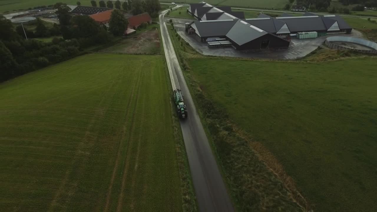 Free Video Stock tractor leaving the farm Live Wallpaper