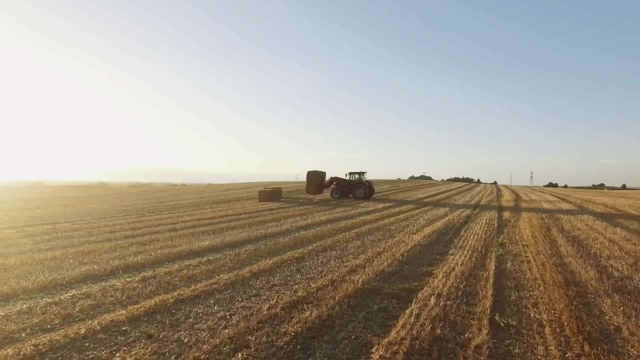 Free Video Stock tractor moving hay Live Wallpaper