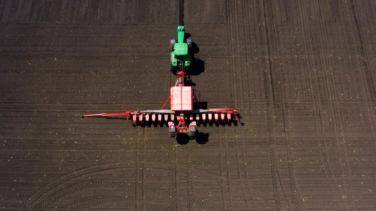 Free Video Stock tractor plowing an agricultural field Live Wallpaper