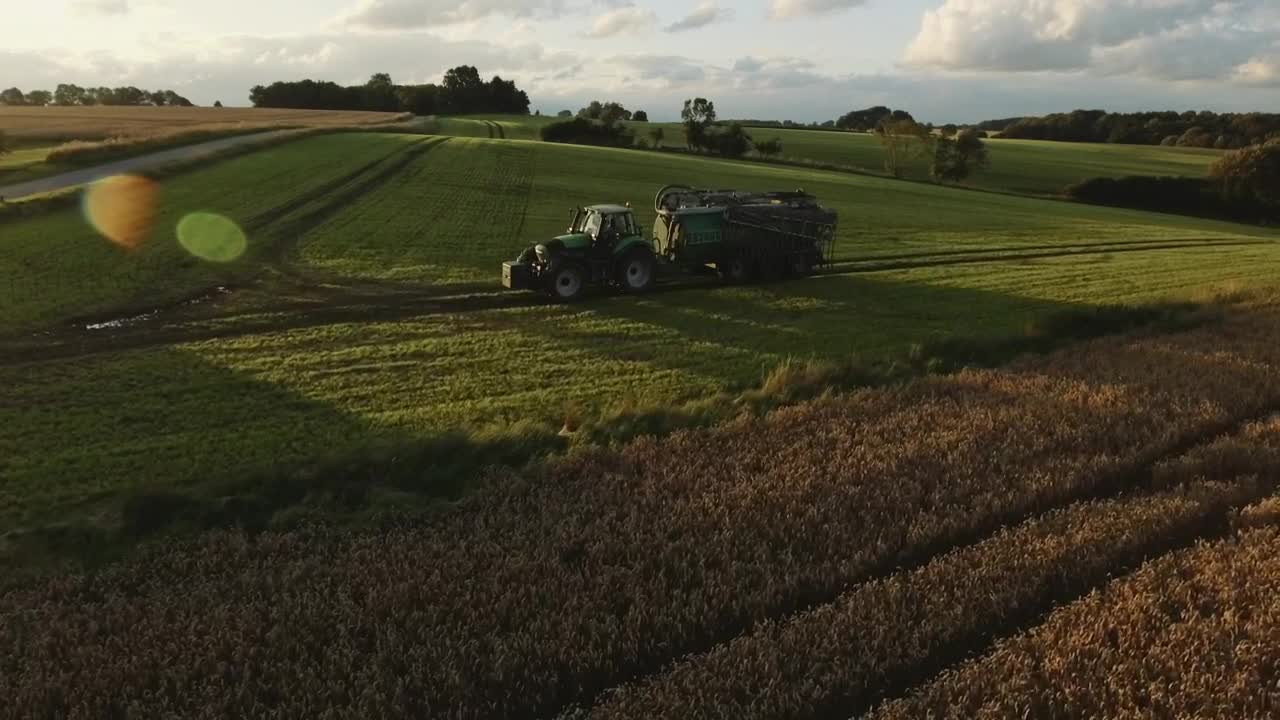 Free Video Stock tractor working in the evening Live Wallpaper