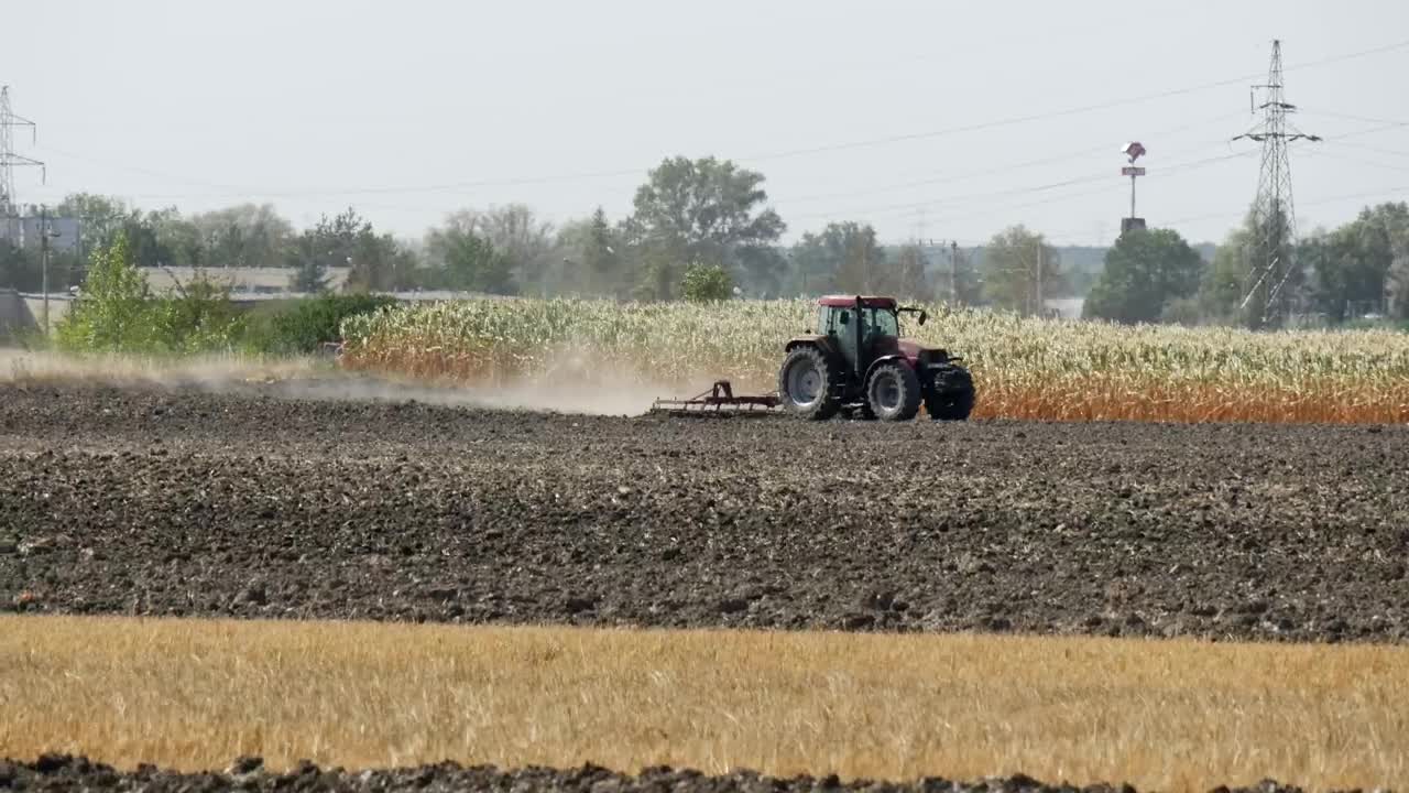 Free Video Stock tractor working on the field Live Wallpaper