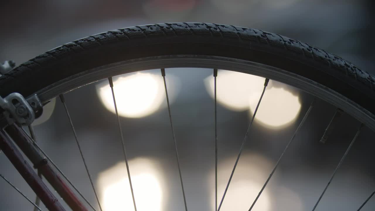 Free Video Stock traffic through a bike wheel Live Wallpaper