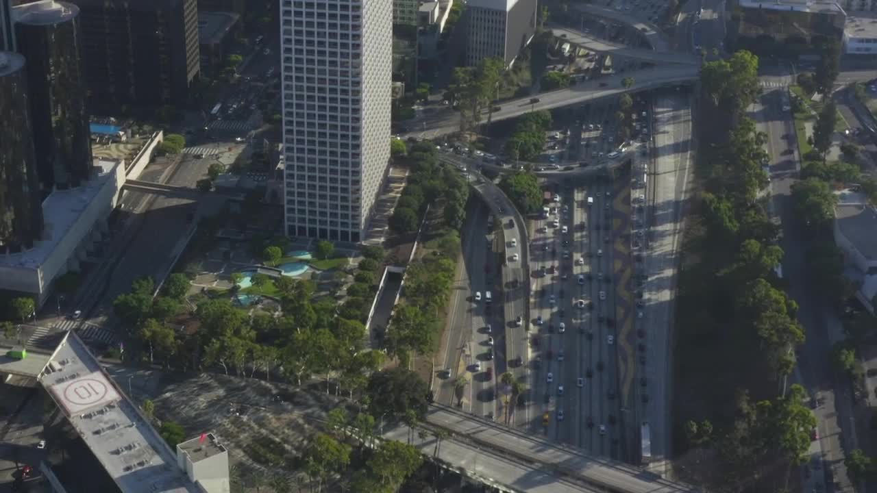 Free Video Stock traffic under los angeles buildings aerial shot Live Wallpaper