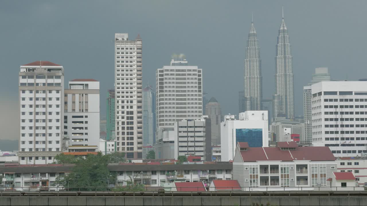 Free Video Stock train heading across the city in kuala lumpur Live Wallpaper