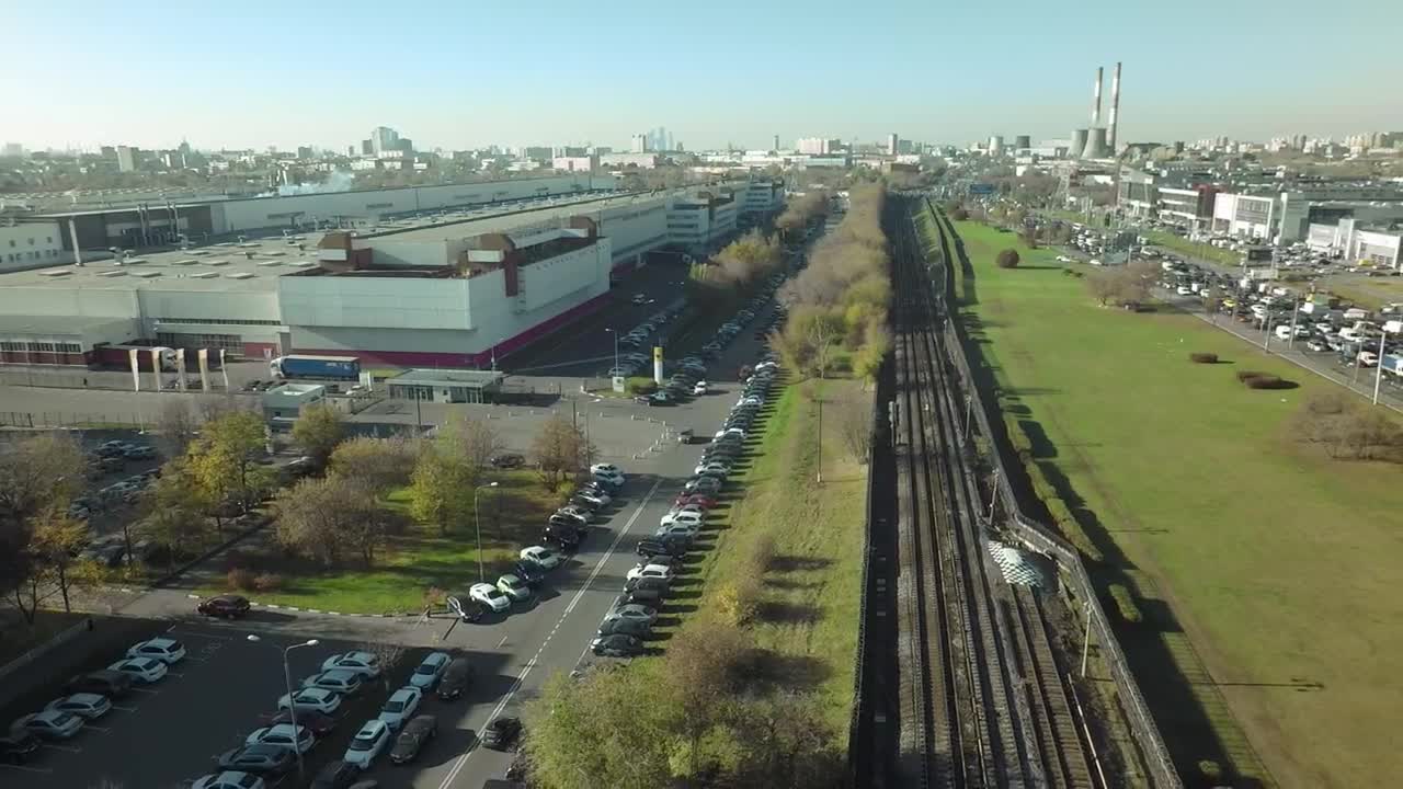 Free Video Stock train heading through an industrial city Live Wallpaper