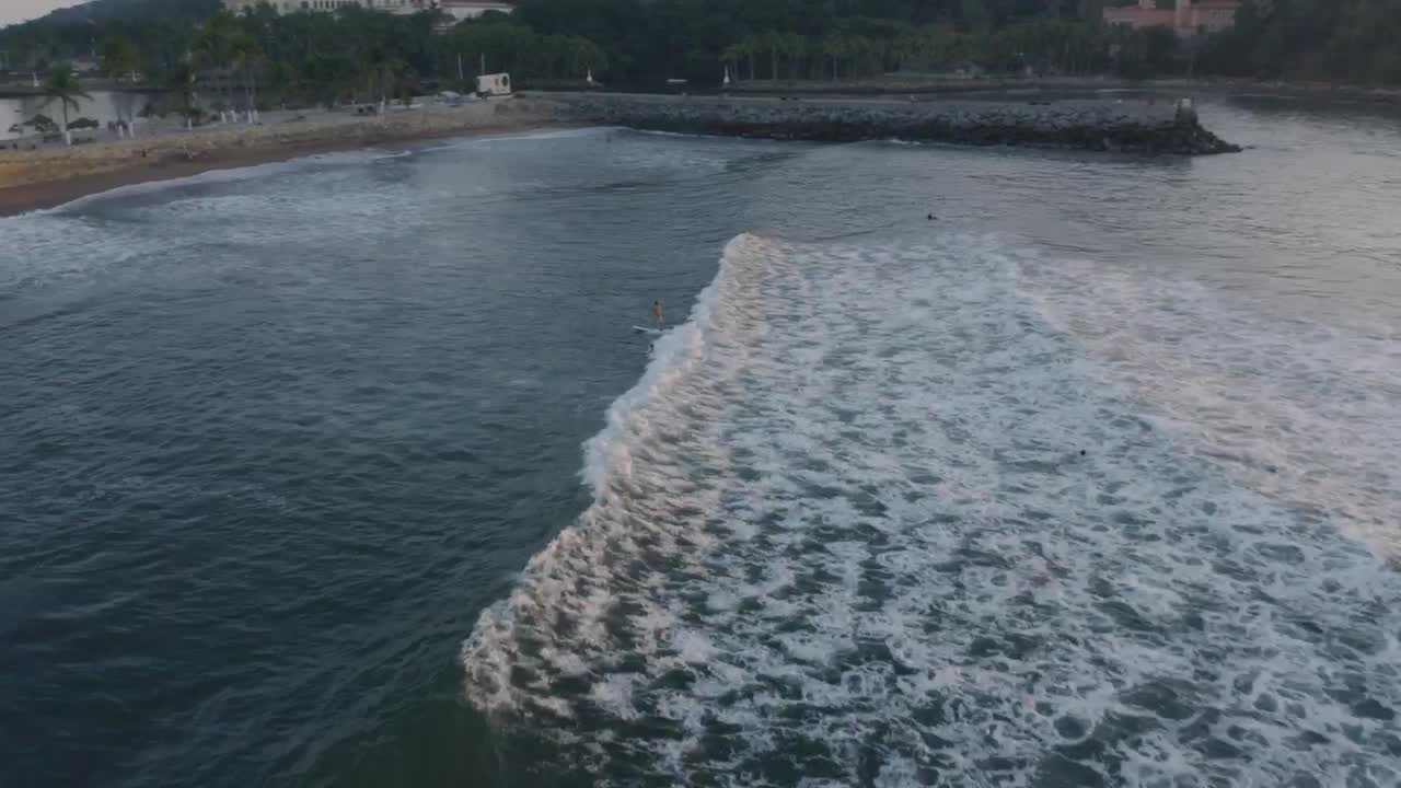 Free Stock Video Waves With Surfers Reaching A Beach Live Wallpaper