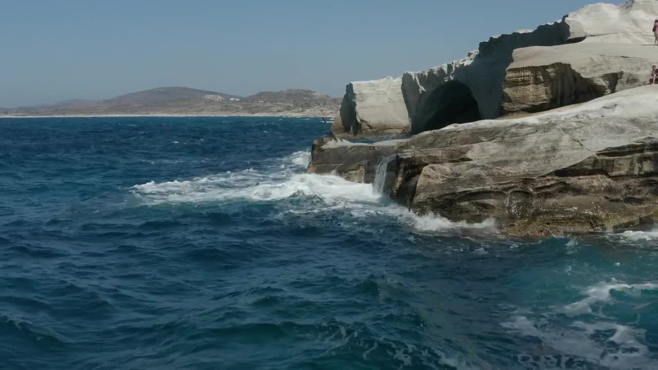 Free Stock Video Waves Hitting A Rocky Cliff In Greece Live Wallpaper