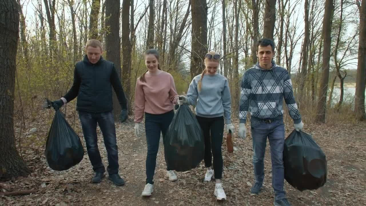 Free Stock Video Volunteers With Garbage Bags In The Forest Live Wallpaper